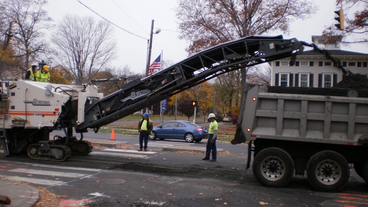 Milling machine resurfacing a municipal street